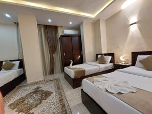 Deluxe Triple Room, Mountain View | Memory-foam beds, minibar, laptop workspace, free WiFi - Tut & Pyramids View (Giza)