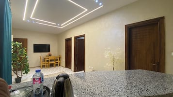 Family Suite, 2 Bedrooms, Desert View, Annex Building | Living area | 32-inch LED TV with satellite channels