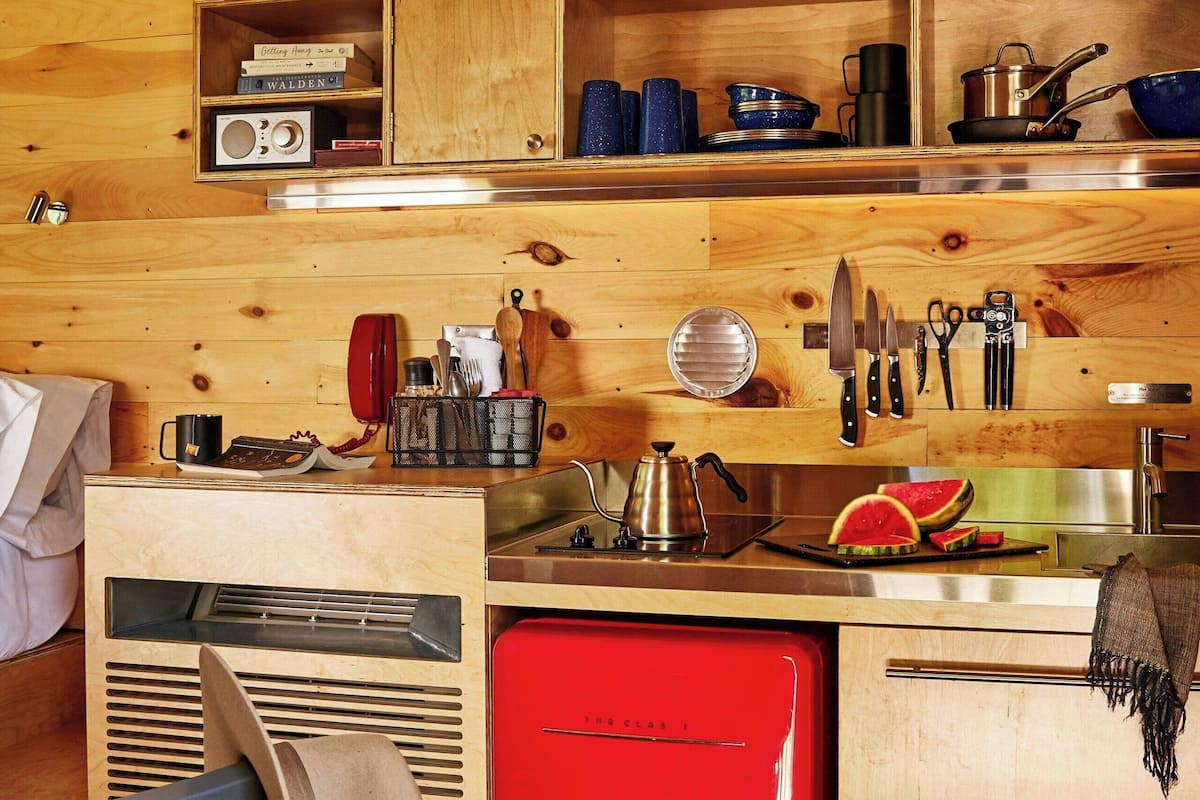 Mini-fridge, stovetop, cookware/dishes/utensils, paper towels
