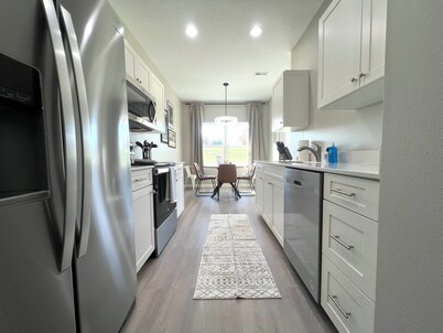 Comfort & Space: 3 King Beds, Large Rooms, Attached Garage!