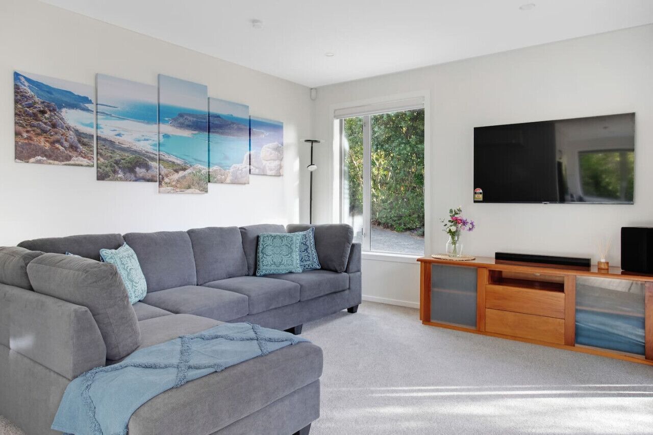 Relax on the couch and watch TV on your large widescreen TV.