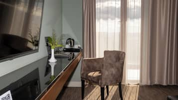 Deluxe Double Room, Pool View | 1 bedroom, in-room safe, desk, laptop workspace