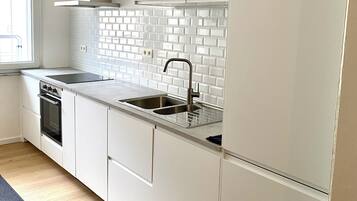 Réfrigérateur, four, plaque de cuisson, lave-vaisselle