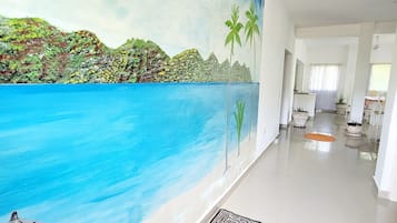 Luxury Apartment, Pool View | Living area | Flat-screen TV