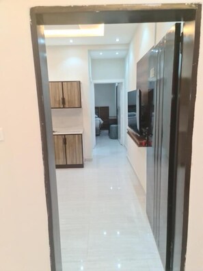 Deluxe Suite, 2 Bedrooms, Balcony, City View | Living area