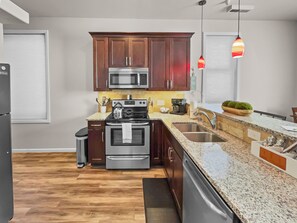 Fridge, microwave, oven, stovetop - The Loft of Historic Charm Downtown and Pet Friendly (Grand Junction)