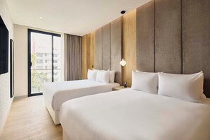 Apartamento Deluxe, balcón | 3 dormitorios, caja fuerte, tabla de planchar con plancha y wifi gratis