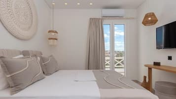 Deluxe Suite, City View | Premium bedding, individually decorated, individually furnished, desk