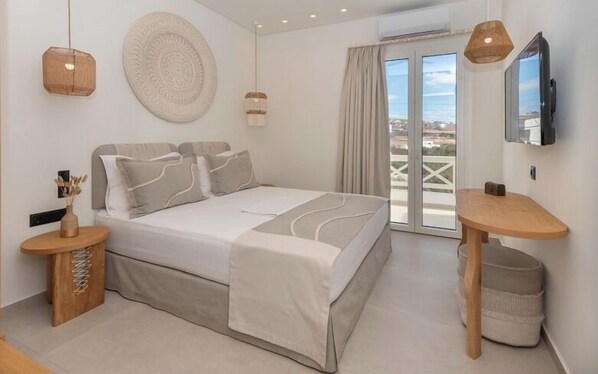 Svit Deluxe - utsikt mot staden | Sängtillbehör av högsta kvalitet, individuell inredning och unika möbler