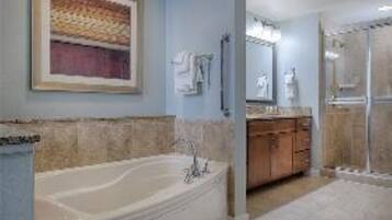 Jetted bath, hair dryer, towels, soap