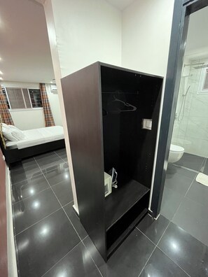 Shower, towels, soap, toilet paper