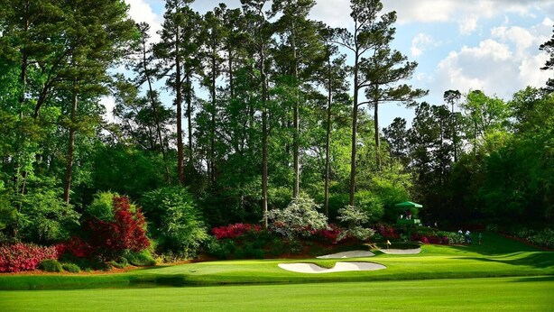 A golf course with sand bunkers, a putting green, and a clubhouse. - Spacious & Private Augusta Getaway Near Downtown! (Augusta)