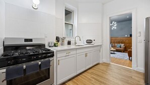 Coffee/tea maker, fridge, microwave, oven