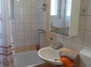 Ducha, secador de pelo, toallas