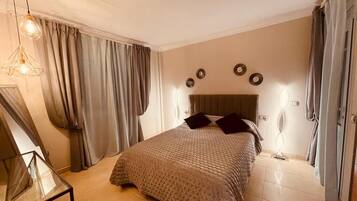 4 dormitorios, tabla de planchar con plancha, wifi y ropa de cama
