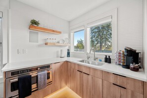 Fridge, microwave, coffee/tea maker, toaster