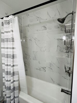 Shower, hair dryer, towels, soap