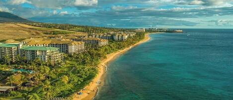 On the beach, sun-loungers, beach towels