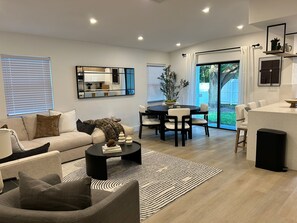 Smart TV, fireplace, books, offices