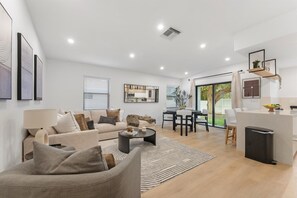 Smart TV, fireplace, books, offices