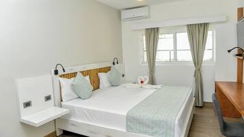 Double Room | Minibar, in-room safe, desk, laptop workspace