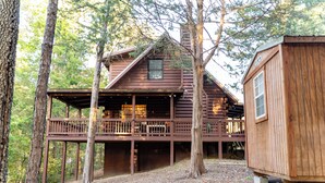 A wooden cabin with a balcony, surrounded by trees. - Visit Star Haven for Labor Day - Fiber Wifi! - Close to Callway Gardens (Warm Springs)