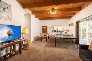 Smart TV, fireplace, DVD player, foosball