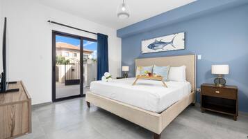 Deluxe Condo, Patio | Iron/ironing board, free WiFi