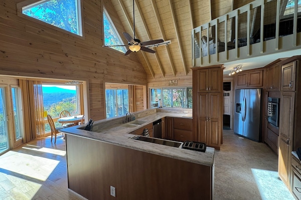 Lots of kitchen counter space and a smooth top stove top. Fully furnished.
