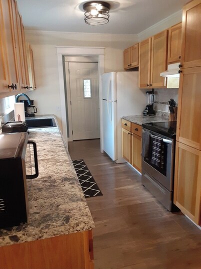  4-bedroom home in Tawas City with indoor pool and game room across from L Huron