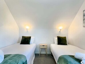 4 habitaciones, tabla de planchar con plancha, cuna de viaje y wifi