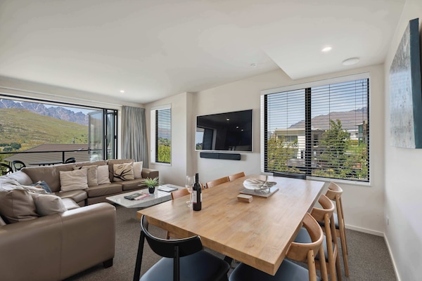 A bright and welcoming space to relax, dine, and take in the mountain views after a day exploring Queenstown.