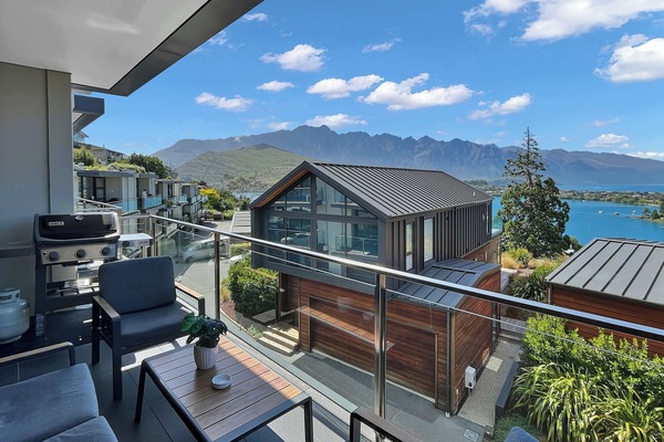 Private balcony with mountain and lake views