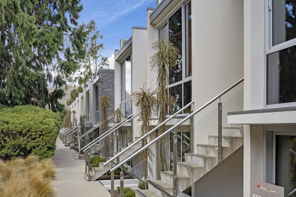 Modern townhouse-style apartment complex.