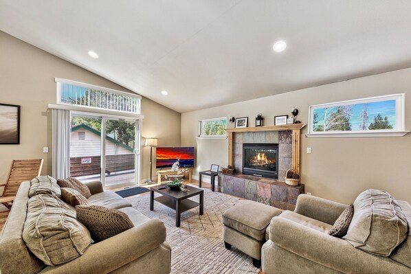 Smart TV, fireplace, table football, books