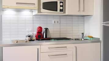 Fridge, microwave, stovetop, coffee/tea maker