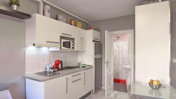 Fridge, microwave, stovetop, coffee/tea maker