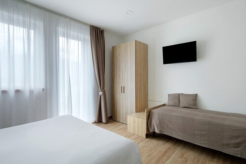 Chambre 'Camera F Bosco' avec vue sur le lac, terrasse partagée et Wi-Fi