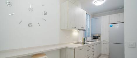 Microwave, stovetop, coffee/tea maker, toaster