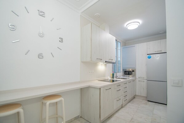 Microwave, stovetop, coffee/tea maker, toaster