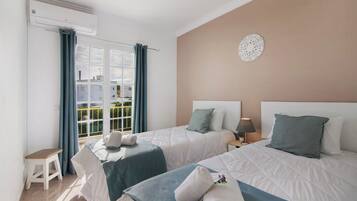 4 dormitorios, tabla de planchar con plancha, wifi gratis y ropa de cama