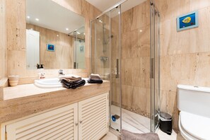Shower, hair dryer, towels