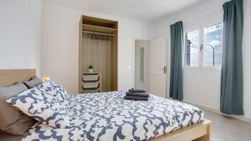 2 dormitorios, tabla de planchar con plancha, wifi gratis y ropa de cama