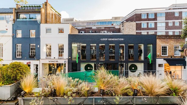 A modern building with a storefront labeled "LOOP GENERATION" and a visible store named "VINCE." - Airy S Kensington 2BR w/ Doorman & Balcony, nr Museums, by Blueground (London)