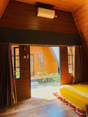 Quarto casal luxo, vista para o jardim | Vista para o jardim