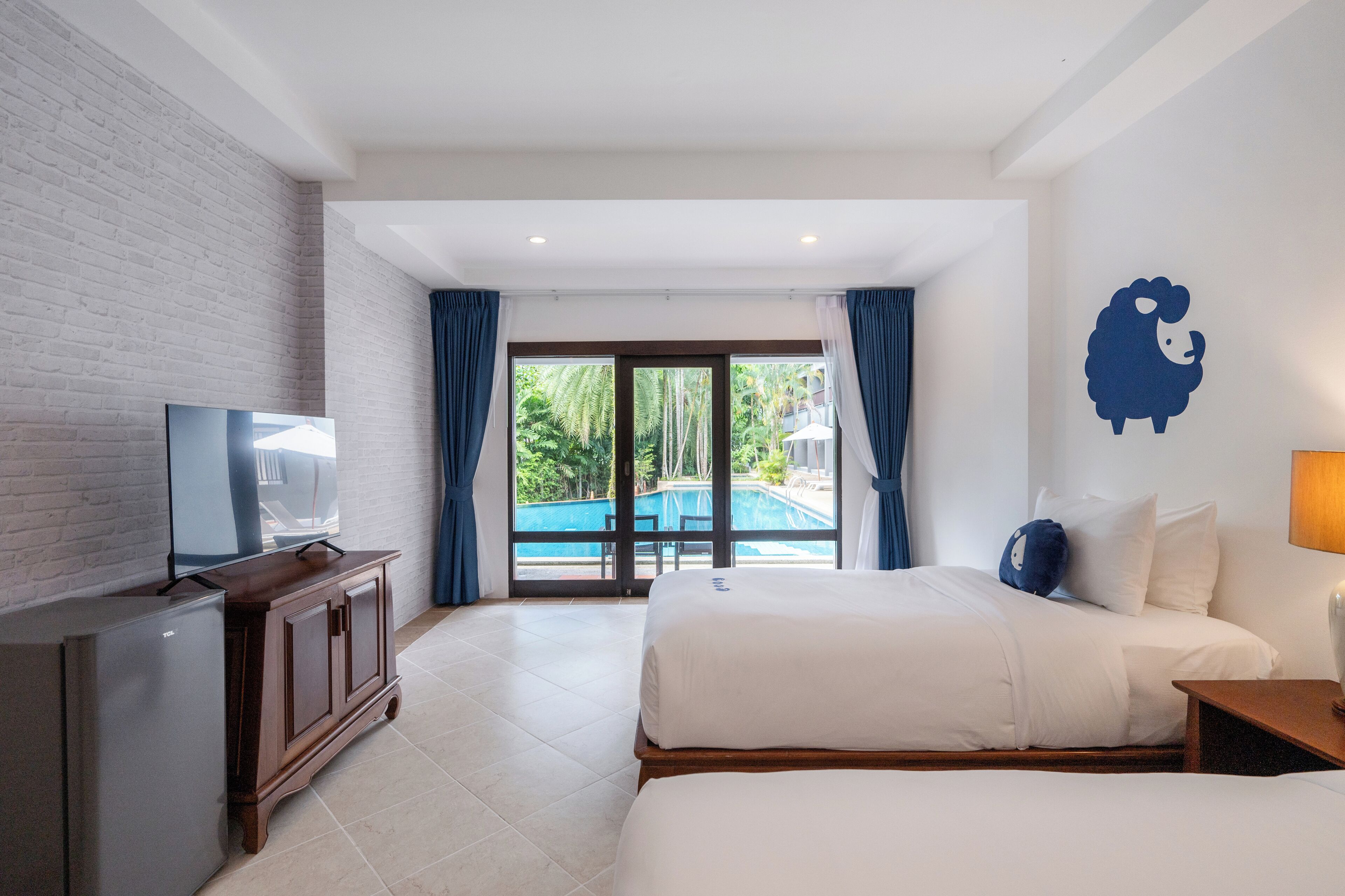 Deluxe Twin Room, Pool Access | Desk, laptop workspace, free WiFi