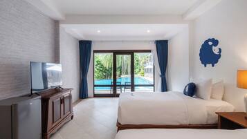 Deluxe Twin Room, Pool Access | Desk, laptop workspace, free WiFi