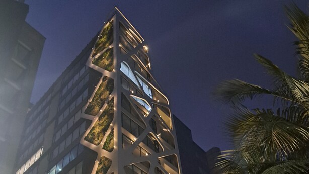 A modern building with a unique geometric facade, large windows, and a rooftop garden. - Luxury Penthouse Suite in La Carolina  (Quito)