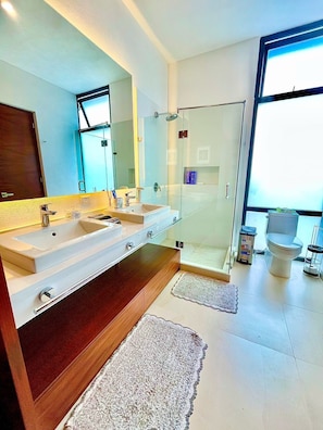 Shower, hair dryer, towels, soap