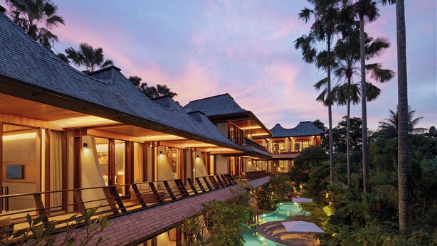 A resort with multiple guest rooms, a swimming pool, and lush tropical vegetation. - The Kemilau Ubud (Ubud)